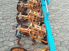 Schmotzer Schmotzer Zwischenachshacke 12 Reihig Hackgerät mit Kulturschutzcheiben 260mm Zwischenachhackgerät Hydraulisch Klappbar 600cm Arbeitsbreite